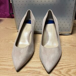 Size 9.5.  Not worn but sold as is.  Small mark from store on side.